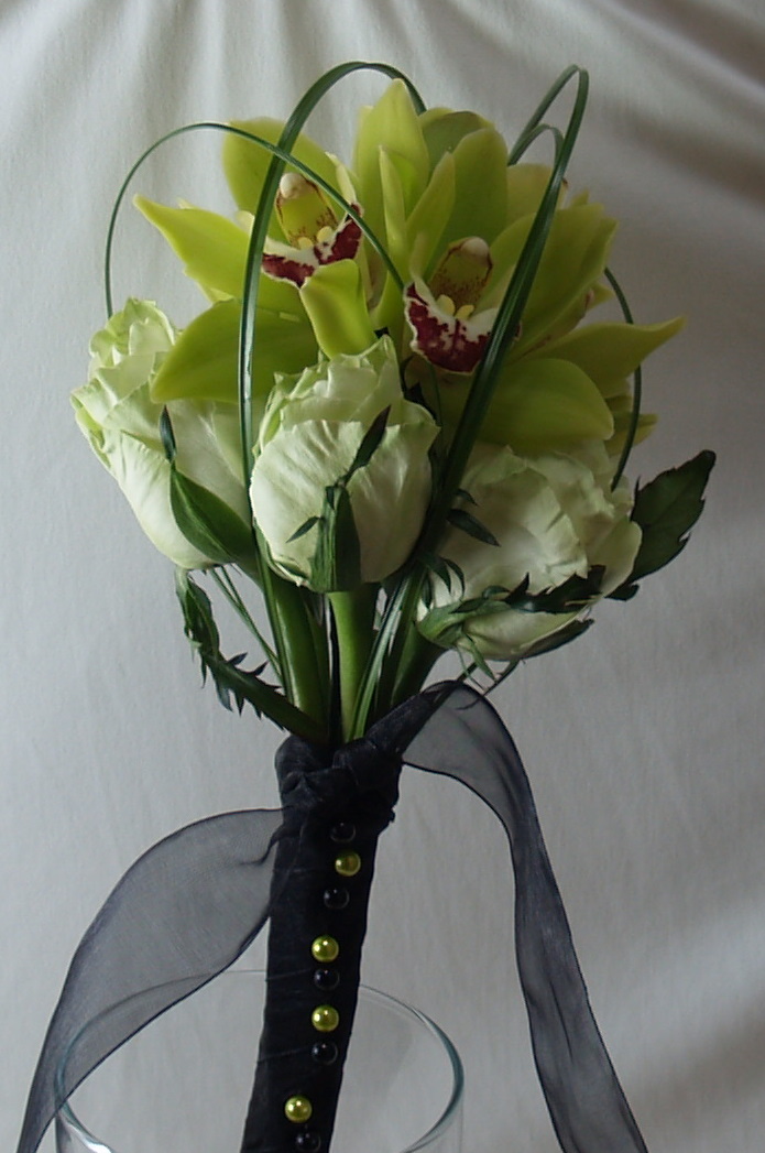 The Bouquet A small hand tied bouquet of green mini cymbidium orchids